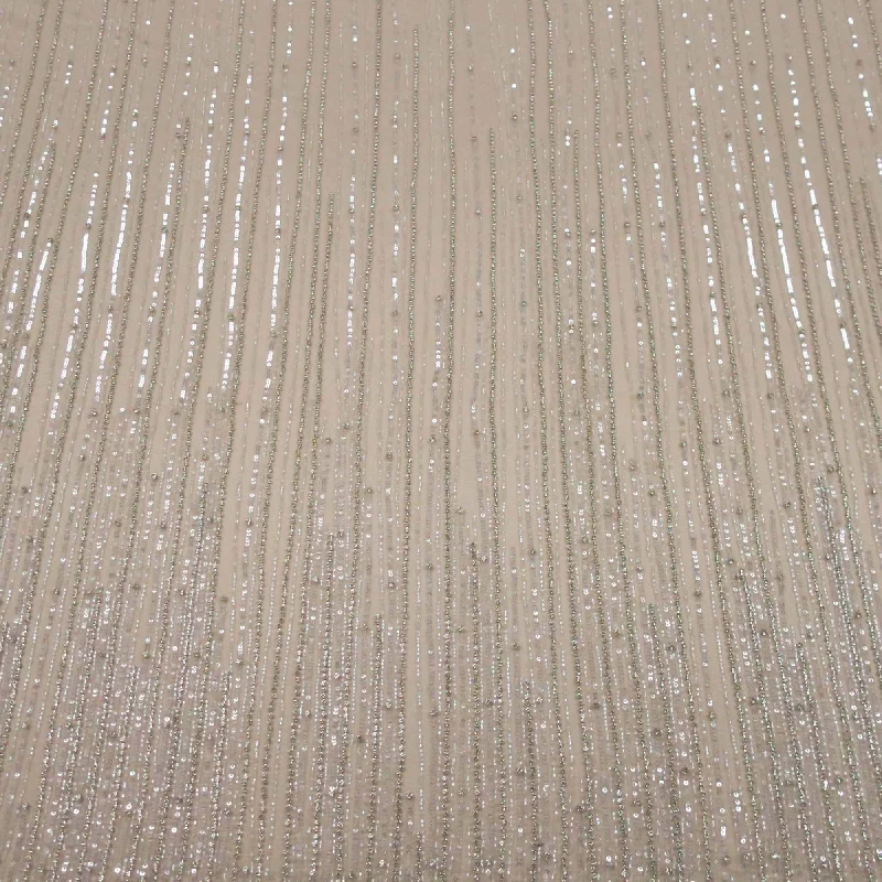 Get It Before It’s Gone Ivory Sequins and Bugle Beads Linear Embroidered Tulle Fabric Get It Before It’s Gone Ivory Sequins and Bugle Beads Linear Embroidered Tulle Fabric
